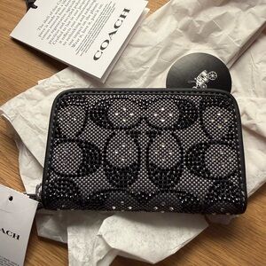 Coach black crystals card case